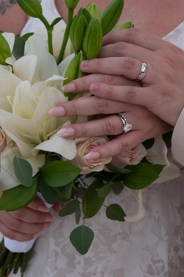 Our Rings With Her Flowers